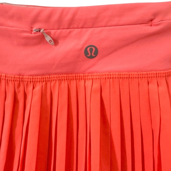 Lululemon Pleat to Street Skirt II in "Grapefruit" Neon Size 8 - Picture 10 of 14